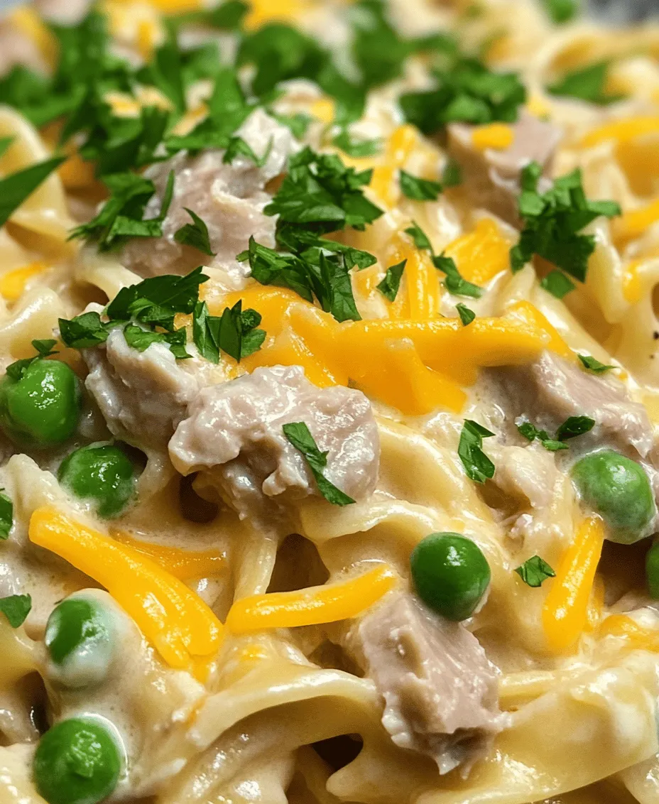 In a world where busy schedules often dictate our meal choices, finding a quick yet nutritious dish can feel like a daunting task. Enter <strong>Creamy Tuna Noodle Delight</strong>, a beloved recipe that has graced American tables for generations. This comforting casserole combines tender egg noodles, flaky tuna, and a creamy sauce, creating a harmonious blend of flavors that warm the heart and satisfy the soul. Not only is this dish easy to prepare, but it also packs a punch of nutrition, making it an ideal choice for families looking to balance convenience with wholesome eating.” /></p>
</p>
<h3>Step-by-Step Instructions Elaborated</h3>
</p>
<h4>Cooking the Noodles</h4>
<p>Cooking the noodles is a crucial step in making Creamy Tuna Noodle Delight. To achieve the perfect texture, start by bringing a large pot of salted water to a rolling boil. Salting the water is essential, as it enhances the flavor of the noodles. Use about one tablespoon of salt for every four quarts of water. Once the water reaches a boil, add your choice of noodles—egg noodles are traditional, but you can also use whole wheat or gluten-free varieties.</p>
</p>
<p>Cook the noodles according to the package instructions, usually around 7-10 minutes, until they are al dente—firm to the bite but cooked through. It’s important not to overcook them, as they will continue to soften when mixed with the sauce. Once cooked, drain the noodles in a colander and set them aside, allowing any excess moisture to escape. This timing is critical to ensure that the noodles maintain their structure and do not become mushy when combined with the creamy sauce.</p>
</p>
<h4>Sautéing the Aromatics</h4>
<p>Sautéing the aromatics is another key step that brings depth and flavor to your dish. In a large skillet, heat a tablespoon of olive oil or unsalted butter over medium heat. Once melted and shimmering, add finely chopped onions and minced garlic. The technique here is to sauté them until they become translucent and fragrant, about 3-5 minutes.</p>
</p>
<p>Be careful not to let the garlic brown, as it can develop a bitter taste. If you want to elevate the flavor further, consider adding finely chopped celery or bell peppers at this stage. These ingredients add a delightful crunch and sweetness. The goal is to create a flavorful base that will permeate throughout the entire dish, so take your time with this step.</p>
</p>
<h4>Combining the Ingredients</h4>
<p>Once the aromatics are ready, it’s time to combine the remaining ingredients. Start by adding a can of drained tuna (preferably packed in water or olive oil) to the skillet. Gently break apart the tuna with a spatula to incorporate it with the sautéed vegetables. Next, add frozen peas directly to the skillet; they will cook quickly and add a pop of color and sweetness.</p>
</p>
<p>To create the creamy sauce, pour in your choice of cream or a combination of cream and broth. Allow the mixture to come to a gentle simmer. This step is crucial for flavor infusion—let the sauce simmer for about 5-7 minutes, stirring occasionally. This not only allows the flavors to meld but also ensures that the peas are heated through. Season with salt, pepper, and any additional spices like smoked paprika or dried dill for an extra flavor boost.</p>
</p>
<h4>Incorporating the Cheeses</h4>
<p>The incorporation of cheese is what gives Creamy Tuna Noodle Delight its signature creamy texture. Once your sauce has simmered, reduce the heat and add in your cheeses. A combination of cream cheese and shredded cheddar works beautifully, but you can use any cheese that melts well.</p>
</p>
<p>To ensure a smooth and creamy consistency, cut the cream cheese into smaller chunks before adding it. Stir the mixture constantly until the cheese is completely melted and well incorporated into the sauce. If the sauce seems too thick, you can add a splash of milk or broth to reach your desired creaminess. This step is essential for achieving that delightful, velvety texture that clings to each noodle.</p>
</p>
<h4>Mixing Noodles and Sauce</h4>
<p>Now that your sauce is creamy and flavorful, it’s time to bring everything together. Add the cooked noodles directly into the skillet with the sauce. Gently toss the noodles with the sauce to ensure even coating. Use tongs or a large spoon to combine; this will help prevent the noodles from breaking apart while also allowing the sauce to envelop every strand.</p>
</p>
<p>If the mixture looks too dry, add more broth or a bit of reserved pasta water to achieve the right consistency. The key here is to ensure that every bite is filled with that rich, creamy flavor. Allow the dish to heat through for an additional 1-2 minutes, then remove it from the heat.</p>
</p>
<h3>Nutritional Information</h3>
<p>Each serving of Creamy Tuna Noodle Delight contains approximately:</p>
</p>
<p>– <strong>Calories</strong>: 400-450</p>
<p>– <strong>Protein</strong>: 25-30 grams</p>
<p>– <strong>Fats</strong>: 15-20 grams</p>
<p>– <strong>Carbohydrates</strong>: 45-50 grams</p>
</p>
<p>The nutritional breakdown shows that this dish is not only satisfying but also packed with protein from the tuna and cheese, making it a filling meal option.</p>
</p>
<h4>Health Benefits of the Main Ingredients</h4>
<p>Tuna is an excellent source of lean protein, omega-3 fatty acids, and essential vitamins and minerals, such as vitamin D and selenium. Peas add fiber, vitamins A and K, and additional protein, making this dish a well-rounded option. Together, these ingredients contribute to a balanced diet, providing necessary nutrients while delivering comfort and flavor.</p>
</p>
<h3>Meal Variations and Customizations</h3>
<p>One of the great aspects of Creamy Tuna Noodle Delight is its versatility. Here are a few suggestions for ingredient swaps and customizations:</p>
</p>
<p>– <strong>Protein Swaps</strong>: Instead of tuna, consider using cooked chicken, shrimp, or even chickpeas for a vegetarian option. Each protein will bring its unique flavor and texture to the dish.</p>
<p>– <strong>Vegetable Additions</strong>: Feel free to add other vegetables such as spinach, broccoli, or bell peppers for added nutrition and color. You can stir-fry them with the aromatics or steam them separately before adding to the mix.</p>
<p>– <strong>Dietary Restrictions</strong>: For a gluten-free version, swap regular noodles for gluten-free pasta. If you are looking for a dairy-free option, use dairy-free cheese alternatives and coconut milk or almond milk for the creamy sauce.</p>
<p>– <strong>Flavor Enhancements</strong>: Experiment with spices and herbs to enhance the flavor. Adding a dash of hot sauce, a sprinkle of Italian seasoning, or fresh parsley can elevate the dish even further.</p>
</p>
<h3>Serving Suggestions</h3>
<p>Serving Creamy Tuna Noodle Delight can be just as enjoyable as making it. Here are some ideas to consider:</p>
</p>
<p>– <strong>Ideal Side Dishes</strong>: This dish pairs wonderfully with a simple green salad dressed in a light vinaigrette, steamed vegetables, or garlic bread for a complete meal. These sides complement the richness of the tuna noodle dish without overwhelming it.</p>
<p>– <strong>Presentation</strong>: To present the dish beautifully, serve it in a large bowl topped with freshly chopped parsley or chives for a touch of color. You can also sprinkle some extra cheese on top just before serving for an appealing, melty finish.</p>
<p>– <strong>Creative Leftover Uses</strong>: If you have leftovers, consider transforming them into a baked casserole. Transfer the mixture to a baking dish, sprinkle with breadcrumbs and extra cheese, then bake at 350°F for about 20 minutes until golden and bubbly. Alternatively, you can use leftovers as a filling for stuffed peppers or a topping for baked potatoes.</p>
</p>
<h3>Conclusion</h3>
<p>Creamy Tuna Noodle Delight is a simple yet comforting dish that brings together flavors and textures in a delightful way. It is a perfect go-to recipe for weeknight dinners or family gatherings, embodying the essence of home-cooked comfort food.</p>
</p>
<p>With its easy-to-follow steps and versatility, this dish can easily become a favorite in your household. By trying out different variations, you can adapt it to suit your family’s tastes and dietary needs.</p>
</p>
<p>Cooking is not just about preparing meals; it’s also about sharing experiences and creating memories with loved ones. So gather your family around the table, enjoy the delicious flavors of this dish, and celebrate the joy of home-cooked meals together.</p>
</div>