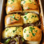 - 1 lb thinly sliced beef steak (ribeye or sirloin works best) - 1 onion, thinly sliced - 1 green bell pepper, thinly sliced - 8 slider buns - 8 slices provolone cheese The beef steak is the star here. Ribeye gives a rich flavor, while sirloin is leaner. Both options are great. Next, we have the vegetables. Onions add sweetness, and green bell peppers give crunch and color. For cheese, provolone melts nicely. You can also use mozzarella for a different taste. - 2 tablespoons olive oil - 1 tablespoon Worcestershire sauce - 1 teaspoon garlic powder - Salt and pepper to taste Olive oil helps cook the veggies. It adds a nice flavor too. Worcestershire sauce adds depth and a bit of tang. Garlic powder gives that warm, savory taste. Salt and pepper are must-haves for seasoning. - 8 slider buns - Fresh parsley for garnish (optional) Slider buns hold all the goodness together. They should be soft but sturdy. Fresh parsley adds a pop of color and freshness. It’s not necessary but it looks nice. Check the full recipe for detailed steps on how to bring all these ingredients together into a tasty dish. Start by heating a large skillet over medium heat. Add 2 tablespoons of olive oil to the skillet. Once the oil is hot, add 1 thinly sliced onion and 1 thinly sliced green bell pepper. Sauté them for about 4-5 minutes. You want the veggies to be soft and slightly translucent. This step adds great flavor to your sliders. Next, increase the heat to medium-high. Add 1 pound of thinly sliced beef steak to the skillet. I recommend using ribeye or sirloin for the best taste. Season the beef with 1 teaspoon of garlic powder, salt, and pepper. Stir and cook for about 3-4 minutes until the beef is browned and cooked through. Pour in 1 tablespoon of Worcestershire sauce and stir to mix everything well. Remove the skillet from heat when combined. Now, preheat your oven to 350°F (175°C). Get a baking dish ready by placing the bottom halves of 8 slider buns in it. Evenly distribute the beef and vegetable mixture over the buns. Then, place 8 slices of provolone cheese on top. Make sure some cheese overlaps to create that melty goodness we all love. Cover the dish with aluminum foil. Bake in your preheated oven for about 10-12 minutes. This helps the cheese melt perfectly. For an extra melty texture, you can remove the foil for the last 2 minutes of baking. Let the sliders cool for a minute before cutting them into individual pieces. You can make these Philly cheesesteak sliders ahead of time. Prepare the beef and veggies, then store them in an airtight container. They will stay fresh for up to three days in the fridge. When you're ready, just reheat the mixture on the stove. For storing leftovers, place the sliders in a container. Cover them tightly to keep them from drying out. They are best eaten within two days. To reheat, warm them in the oven at 350°F (175°C) for about 10 minutes. This keeps the sliders soft and the cheese melty. To add more flavor, try using spices like smoked paprika or crushed red pepper. These spices can give your sliders a nice kick. You can also mix in some sautéed mushrooms for an earthy taste. Balancing flavors is key. If your beef is rich, add a splash of vinegar for tang. Fresh herbs like cilantro or basil can brighten the dish. Just sprinkle some on before serving for a fresh touch. These sliders go well with a side of crispy fries or a fresh salad. You could also serve them with coleslaw for a crunchy contrast. For drinks, cold beers or sweet iced tea pair nicely with the savory sliders. If you want something fun, try a fruity soda to complement the flavors. You can even make a small platter with different dips like ranch or spicy ketchup. This adds a fun twist to your game day spread. {{image_2}} Philly cheesesteak sliders are versatile. You can easily switch up the ingredients to suit your taste. One great option is swapping beef for chicken or turkey. Thinly sliced chicken or turkey works well. It keeps the dish light but still tasty. For vegetarian options, try using mushrooms and bell peppers. The mushrooms give a nice meaty texture. Pair them with colorful peppers for added flavor. Want to add some heat? Toss in jalapeños for a spicy kick. They bring a nice crunch and warmth to each bite. You can also explore different cheese varieties. Try cheddar, gouda, or even pepper jack for a fun twist. Each cheese adds its own unique flavor. Consider the size of your sliders. Mini sliders are perfect for parties. They let guests enjoy a bite-sized treat. Full-size sliders can be a hearty meal. When it comes to presentation, think about how you serve them. Arrange sliders on a large platter. Add fresh parsley for a pop of color. This makes your dish look as good as it tastes. For the Full Recipe, check out the detailed instructions. To store leftover Philly Cheesesteak Sliders, place them in an airtight container. Make sure to seal it tightly. This keeps the sliders fresh and prevents them from drying out. You can also wrap them in plastic wrap before placing them in a container for added protection. The shelf life of your sliders in the fridge is about 3 to 4 days. After this time, the flavors may fade, and the texture can change. You can freeze Philly Cheesesteak Sliders before or after baking. If you freeze them before baking, assemble the sliders as usual, but skip the baking step. Wrap them tightly in plastic wrap and then in aluminum foil. This helps prevent freezer burn. If you choose to freeze after baking, let the sliders cool completely first. Then, wrap them well and place them in a freezer-safe bag. For reheating frozen sliders, take them out and let them thaw in the fridge overnight. This keeps them from getting soggy. When you are ready to enjoy, bake them at 350°F (175°C) for about 15 to 20 minutes. This will help regain that fresh-baked taste and melty texture. Philly cheesesteak sliders can last up to three days in the fridge. Store them in an airtight container to keep them fresh. If you want them to taste great, eat them within this time. After three days, they may lose flavor and texture. Yes, you can make these sliders without cheese. Try using mashed avocado or hummus for a creamy texture. You can also add more veggies like mushrooms or spinach for added flavor. This keeps the dish tasty while fitting your diet. Many sides go well with these sliders. Here are some popular choices: - Potato chips - French fries - Coleslaw - Pickles - Sweet potato fries These sides add crunch and balance the rich flavor of the sliders. To spice up your sliders, consider these options: - Add sliced jalapeños for a nice kick. - Use pepper jack cheese instead of provolone. - Mix in hot sauce with the beef and veggies. These options add heat without taking away the great flavors of the cheesesteak. Philly Cheesesteak Sliders are fun to make and taste great. We discussed key ingredients like ribeye, onions, and provolone cheese. I shared easy steps to cook everything and assemble the sliders. You can customize flavor with spices and even switch up main ingredients. Plus, I gave tips on storing and reheating your sliders for future meals. Don't forget to explore add-ons and serving ideas for your next gathering. Enjoy making these delicious treats for family or friends!